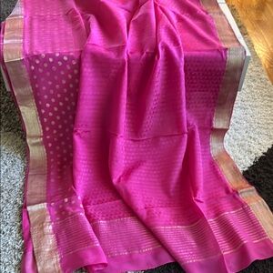 Vibrant Pink Silk Saree with Gold Accents
